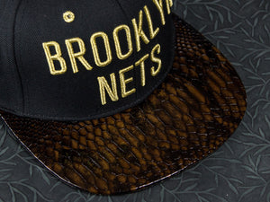 Brooklyn Nets Gold Edition Snakeskin Strapback